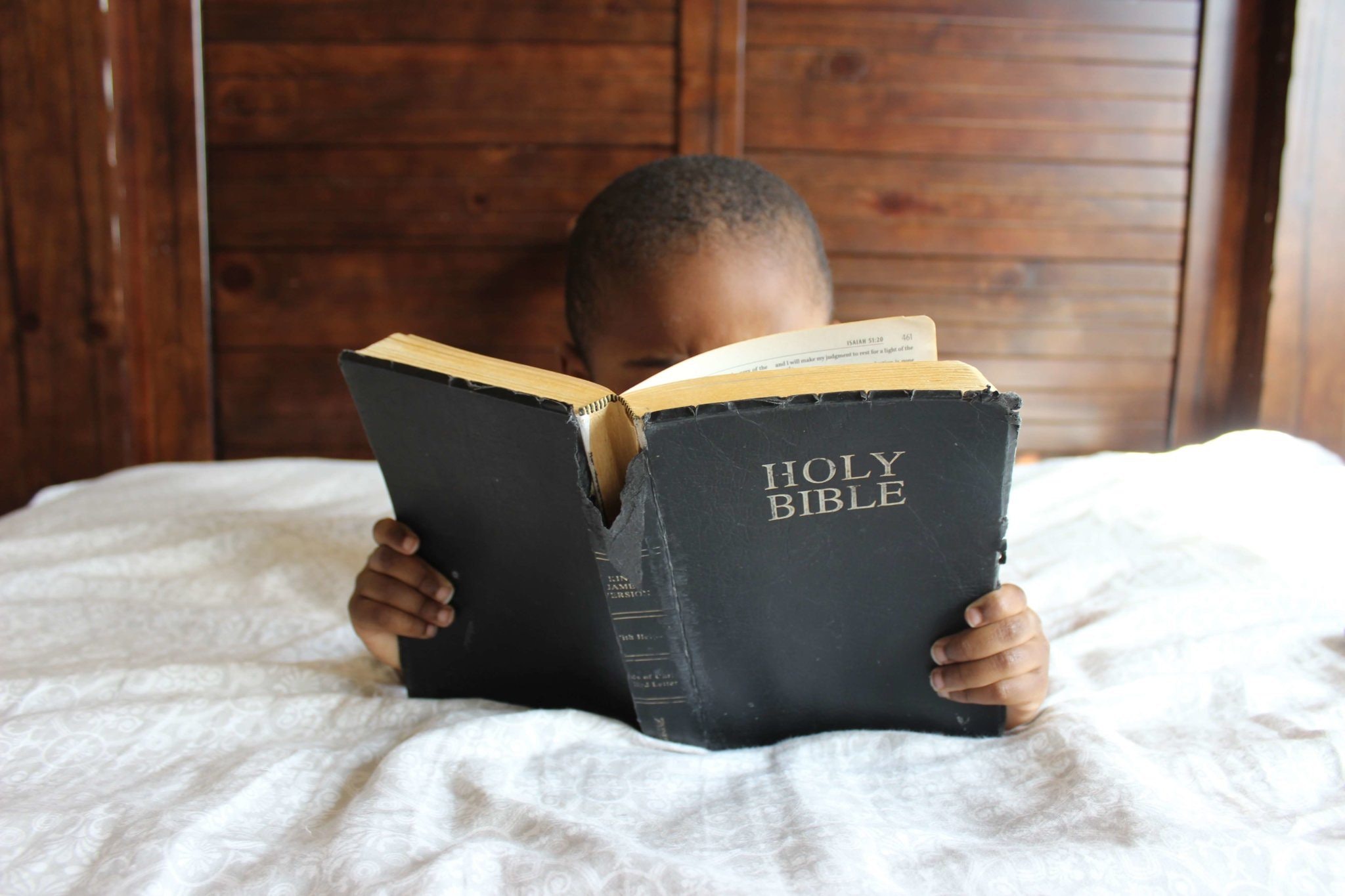photo-of-child-reading-holy-bible-935944.jpg